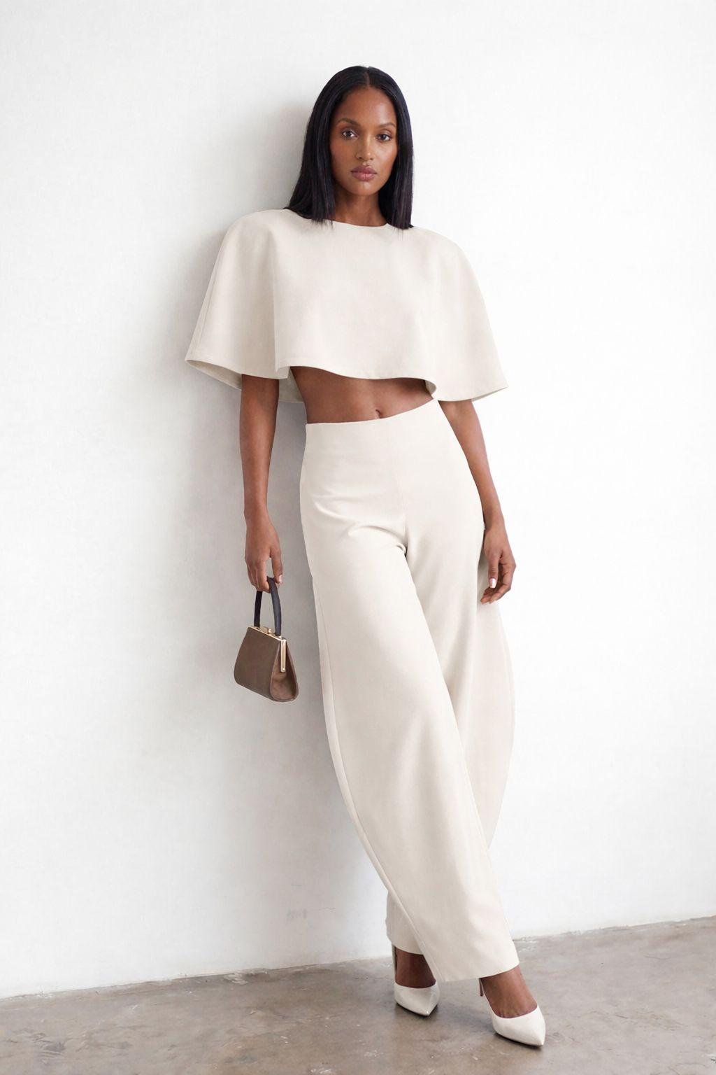 חליפת שכמייה בל